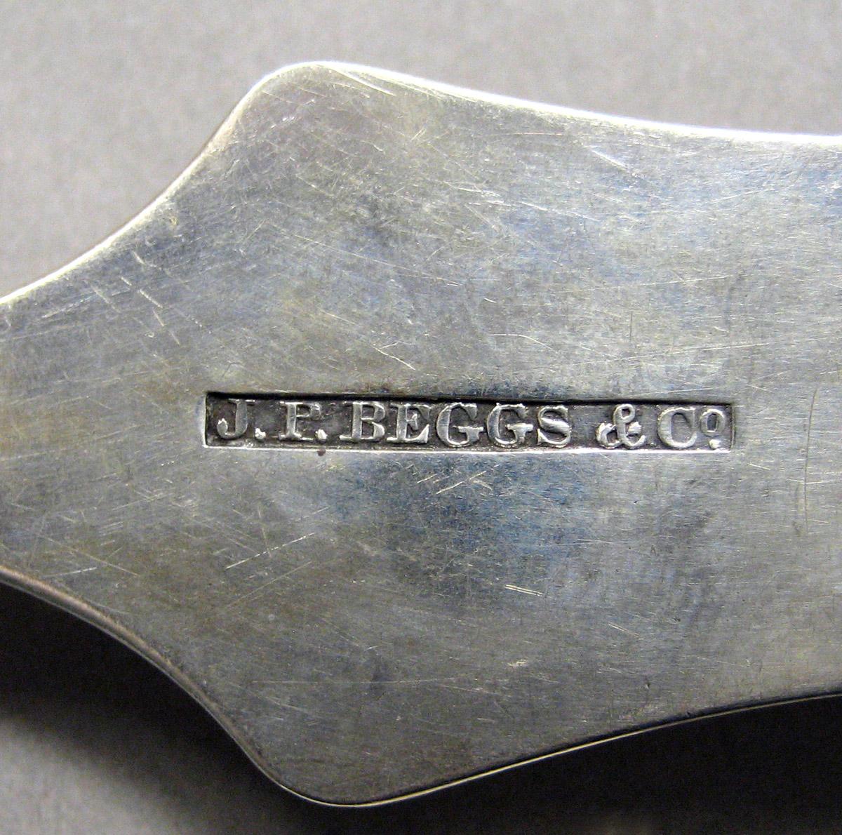 1998.0004.3412 Silver spoon mark