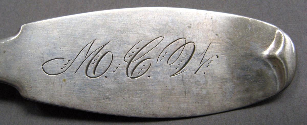 1998.0004.3423 Silver ladle engraving