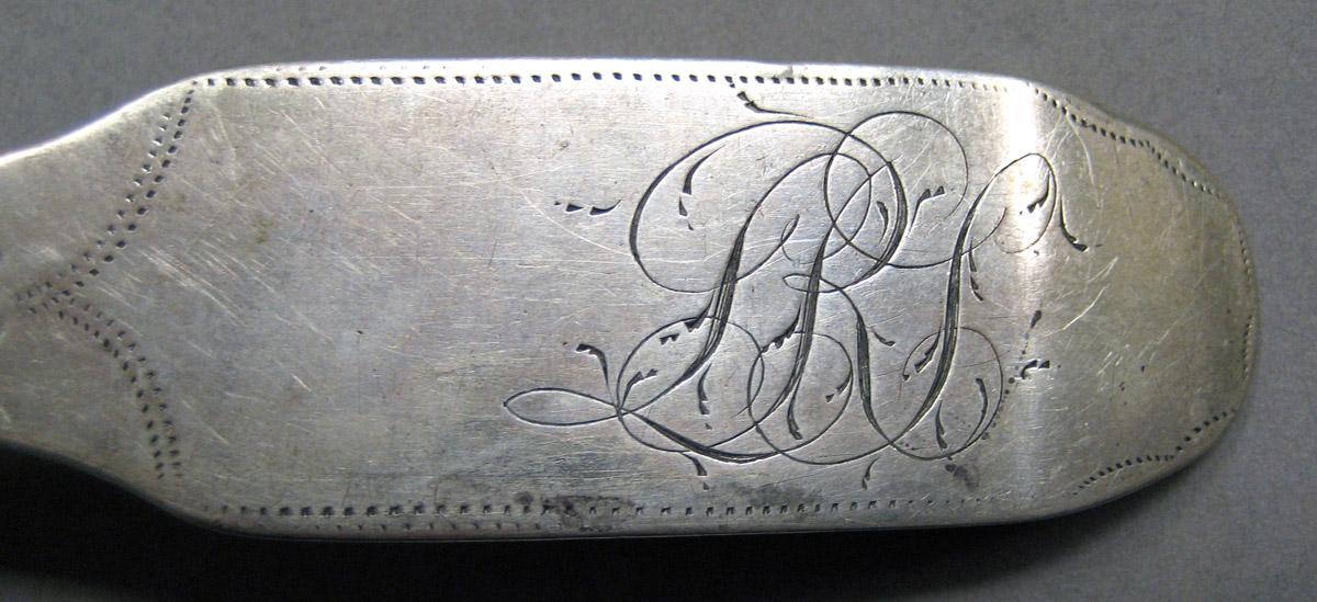 1998.0004.3427 Silver spoon engraving