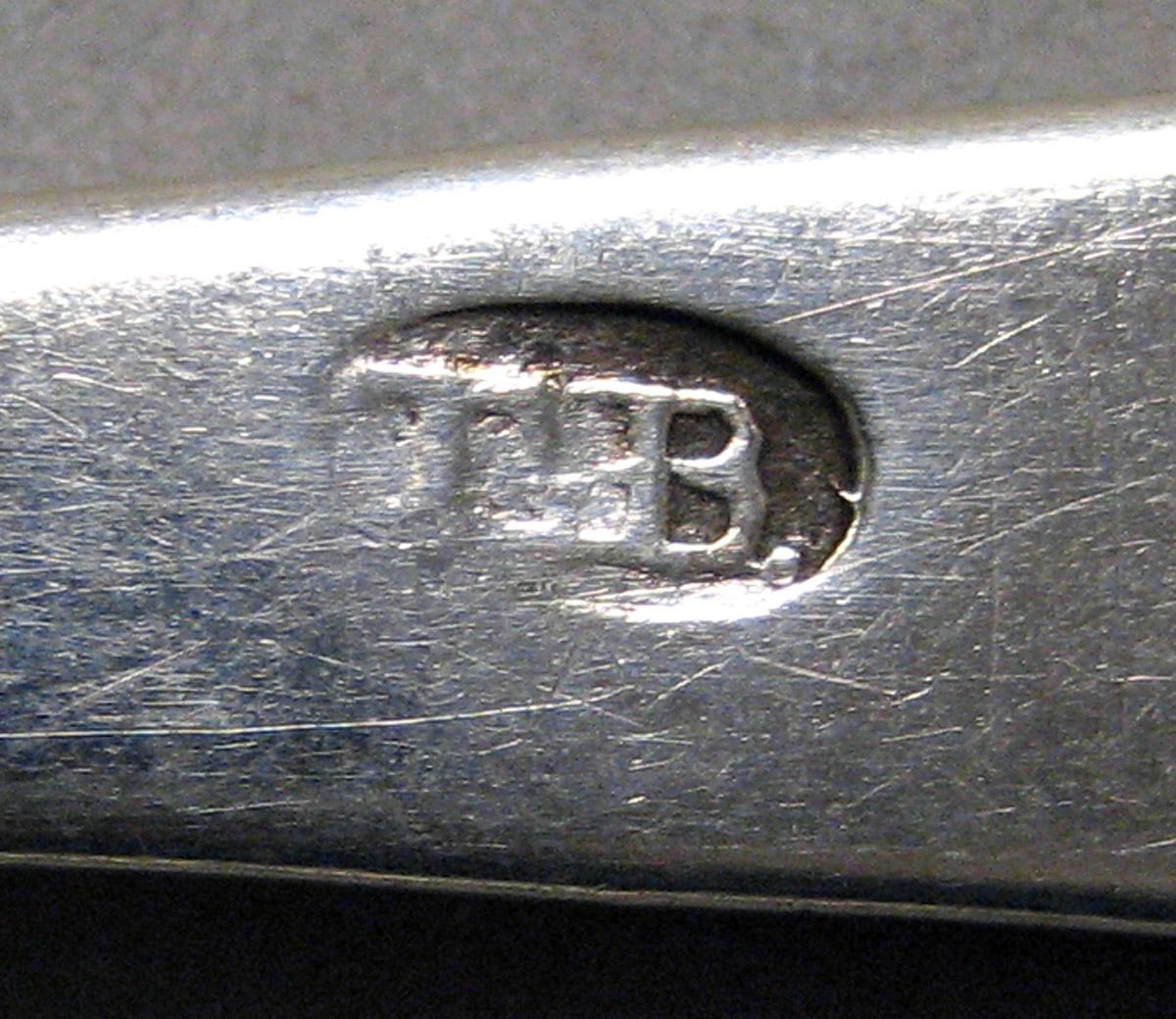 1998.0004.3430 Silver spoon mark
