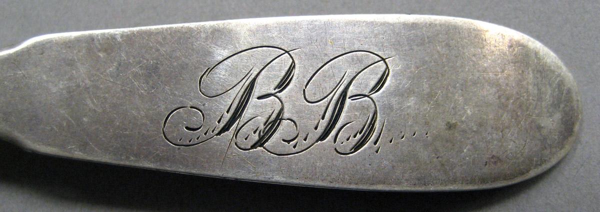 1998.0004.3432 Silver spoon engraving
