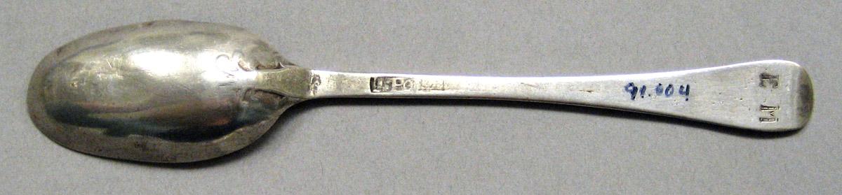 1998.0004.3504 Silver spoon underside