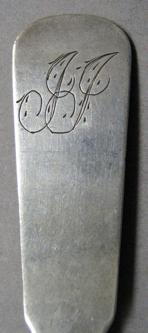 1998.0004.3536 Silver spoon engraving