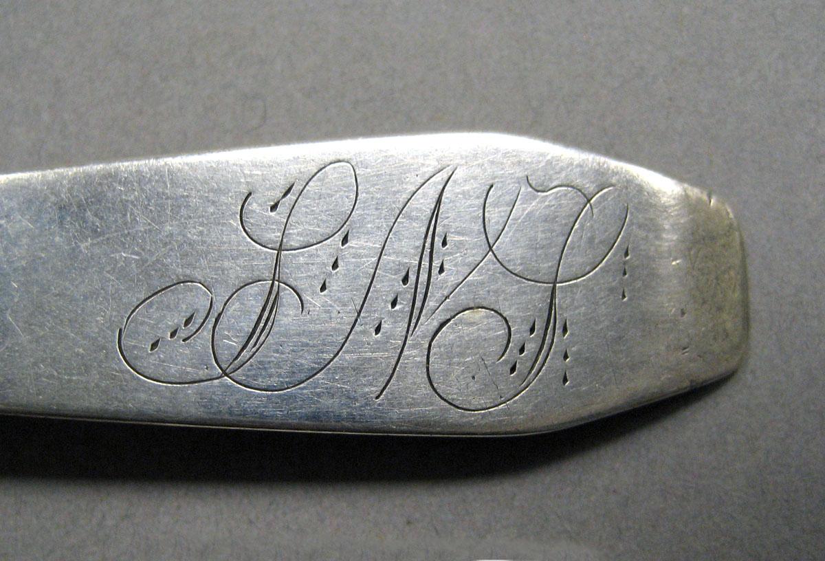 1998.0004.3540 Silver spoon engraving
