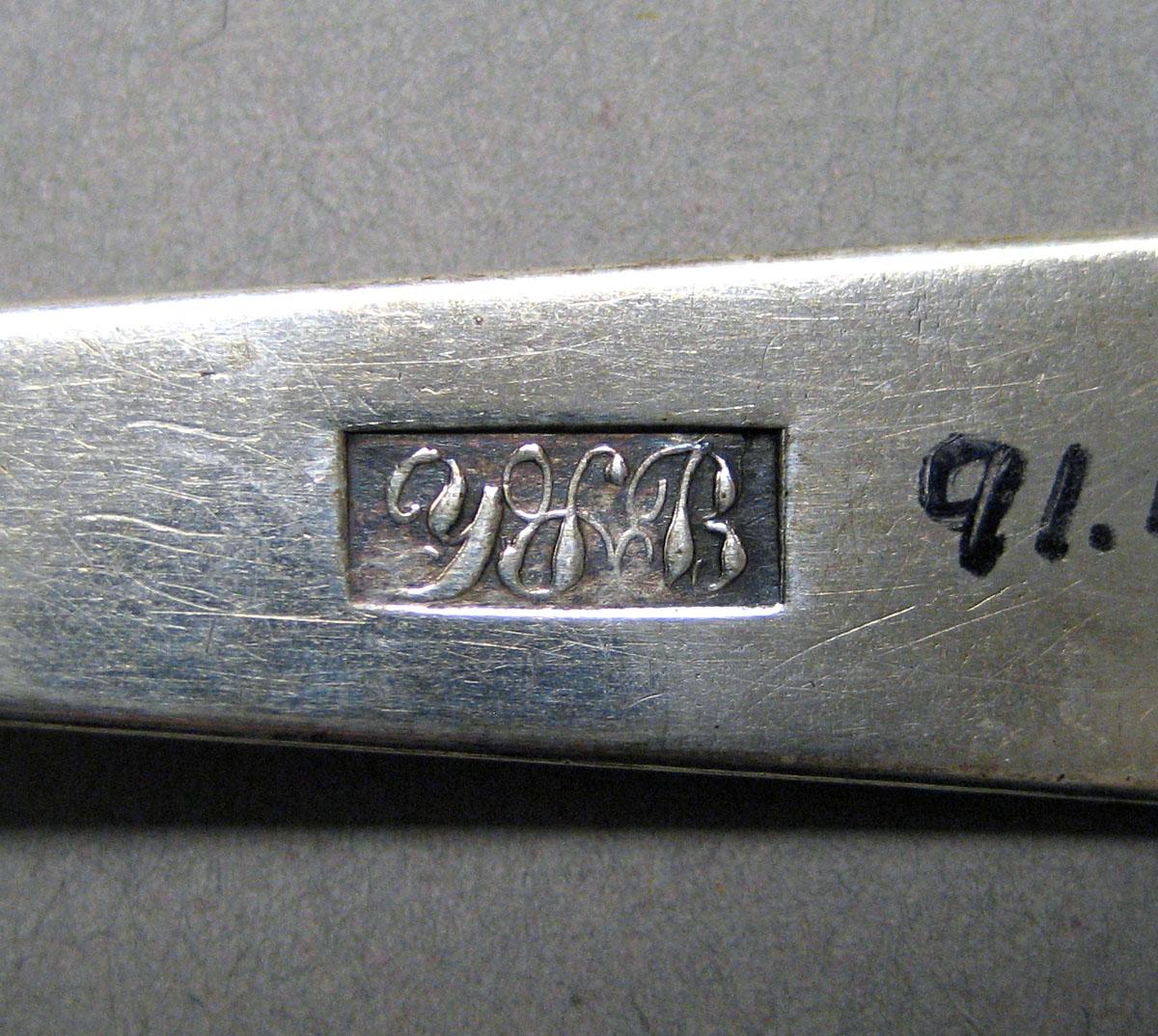 1998.0004.3540 Silver spoon mark