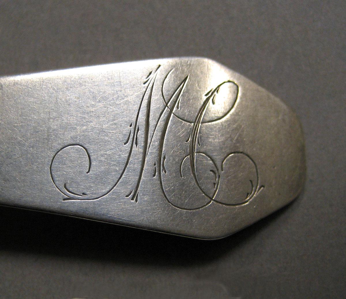 1998.0004.3545 Silver spoon engraving
