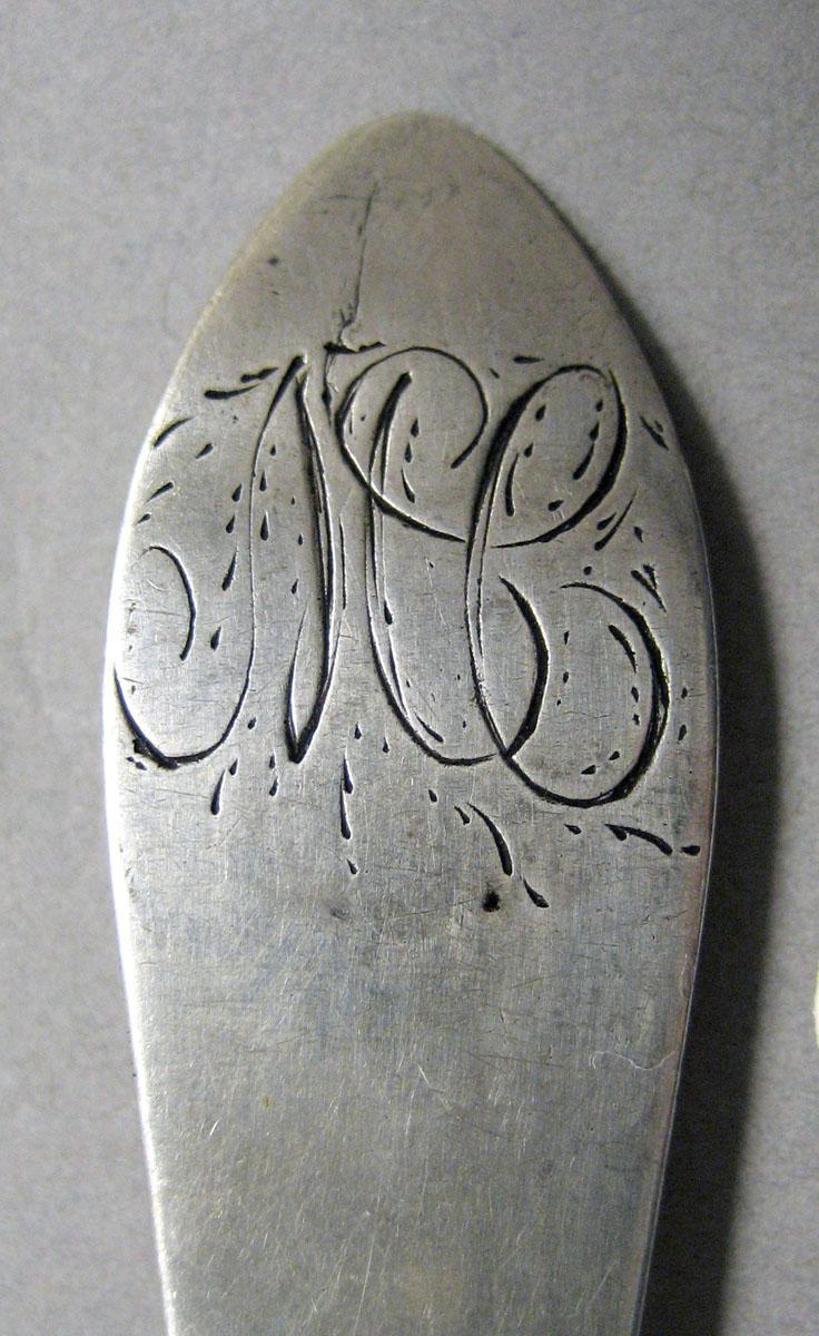 1998.0004.3560 Silver spoon engraving