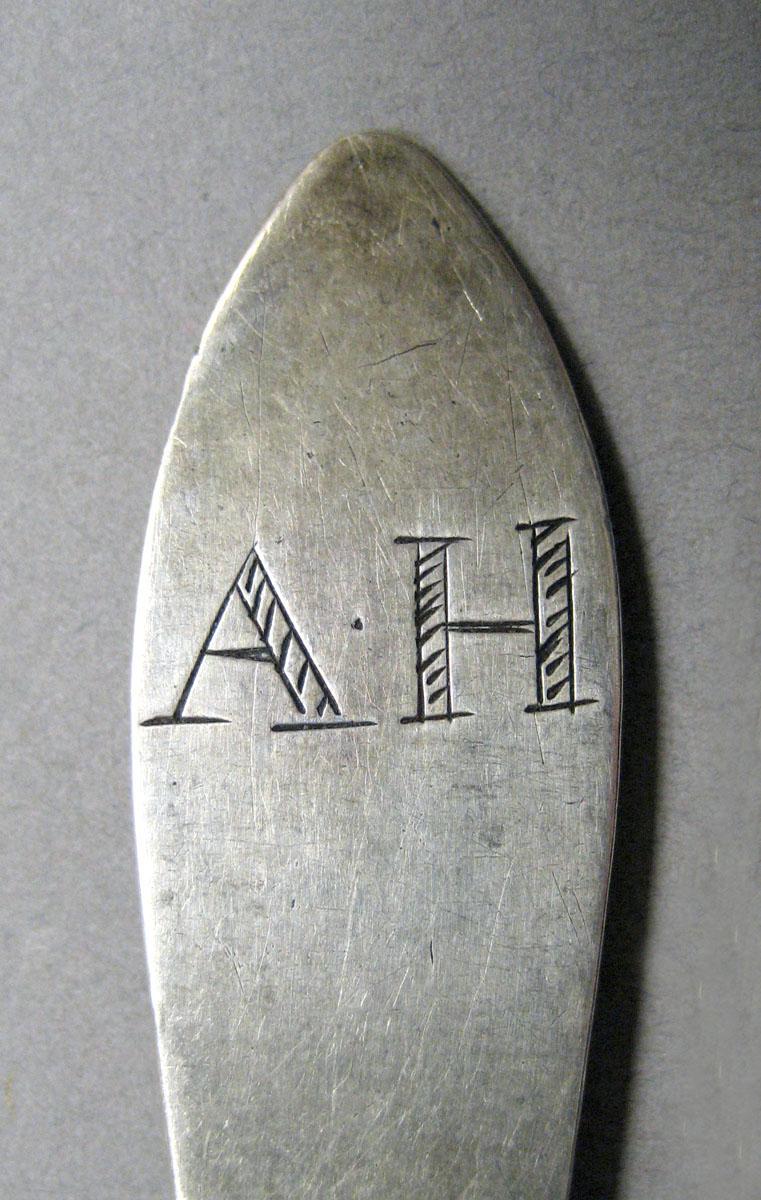 1998.0004.3561 Silver spoon engraving