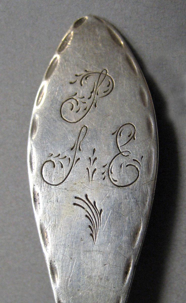 1998.0004.3565 Silver spoon engraving
