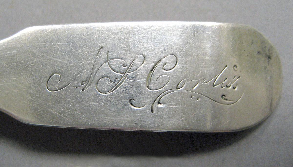 1998.0004.3566.006 Silver spoon engraving