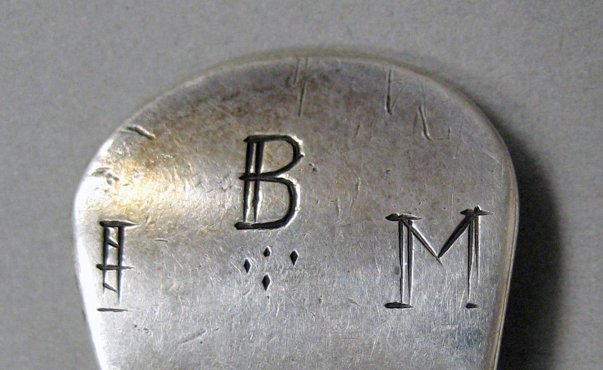 1998.0004.3588 Silver spoon engraving