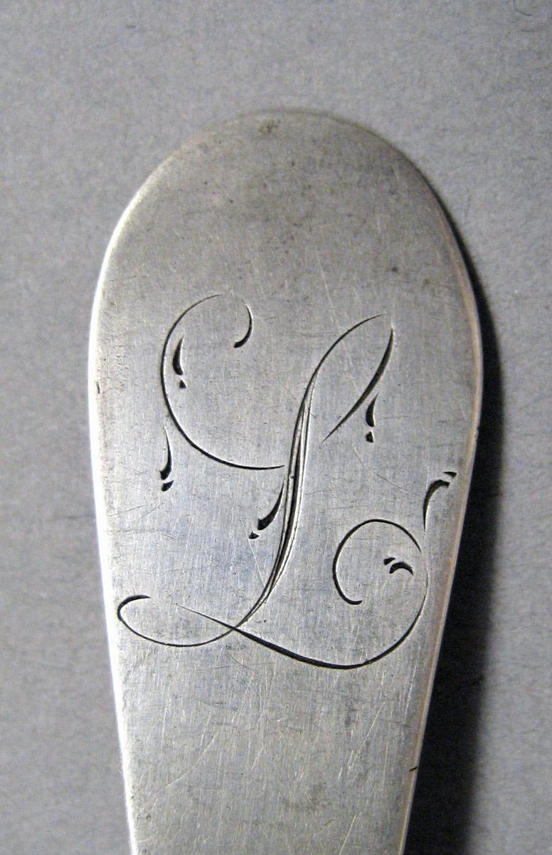 1998.0004.3590 Silver spoon engraving