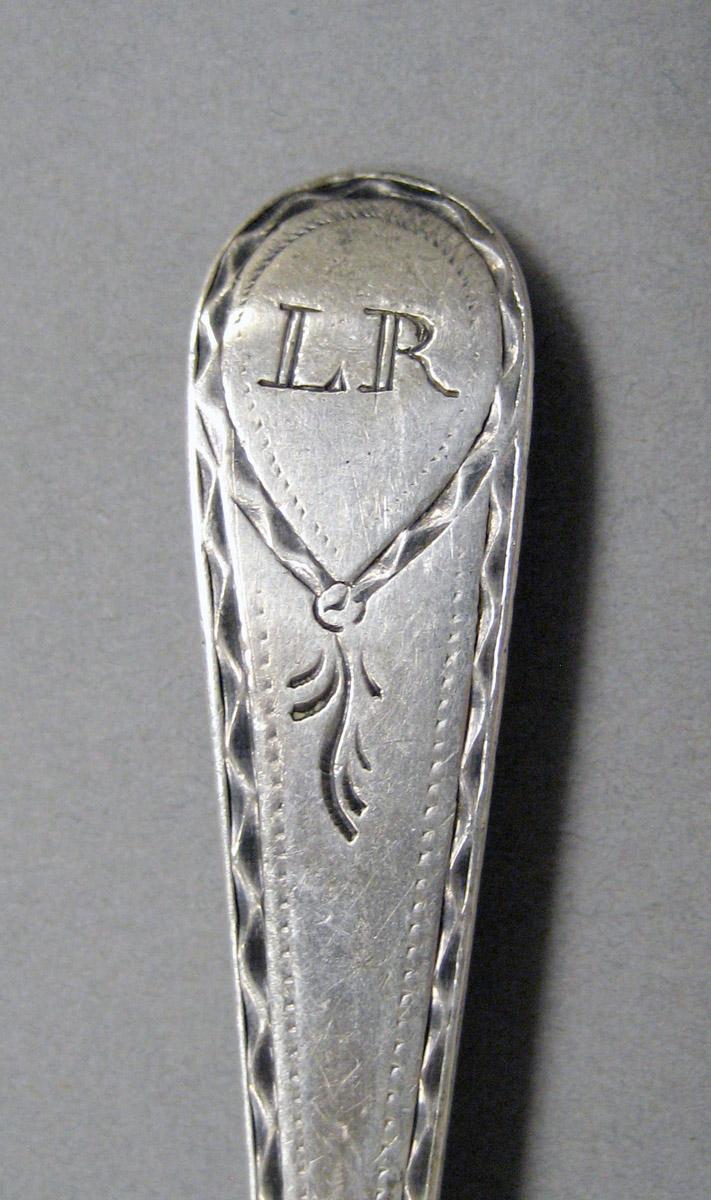 1998.0004.3591 Silver spoon engraving
