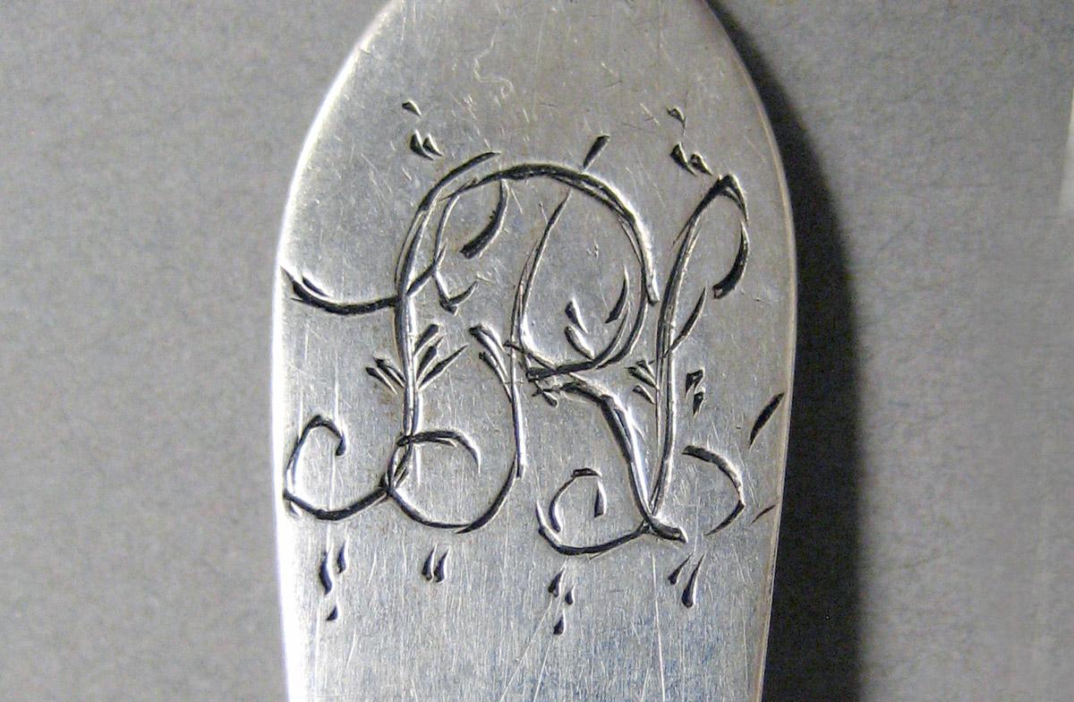 1998.0004.3592 Silver spoon engraving