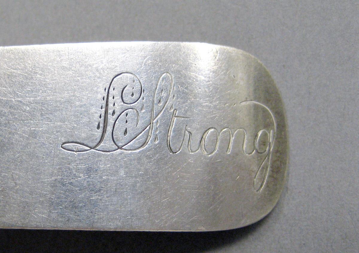 1998.0004.3593 Silver spoon engraving