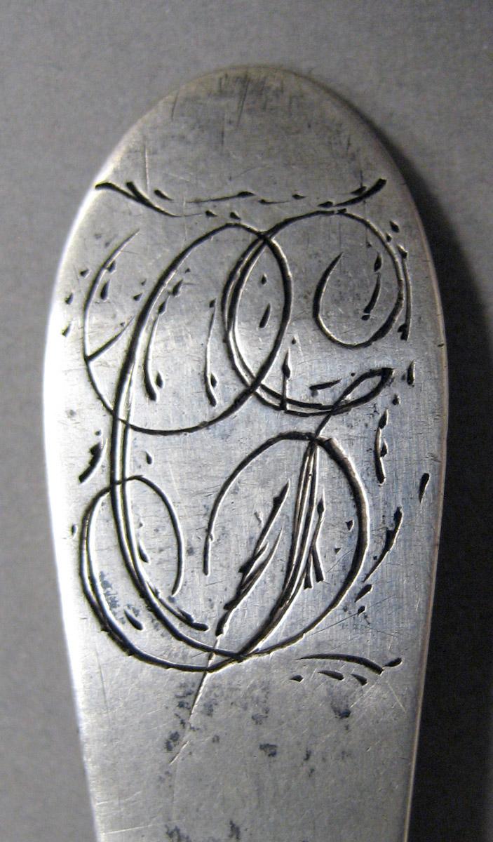 1998.0004.3595 Silver spoon engraving