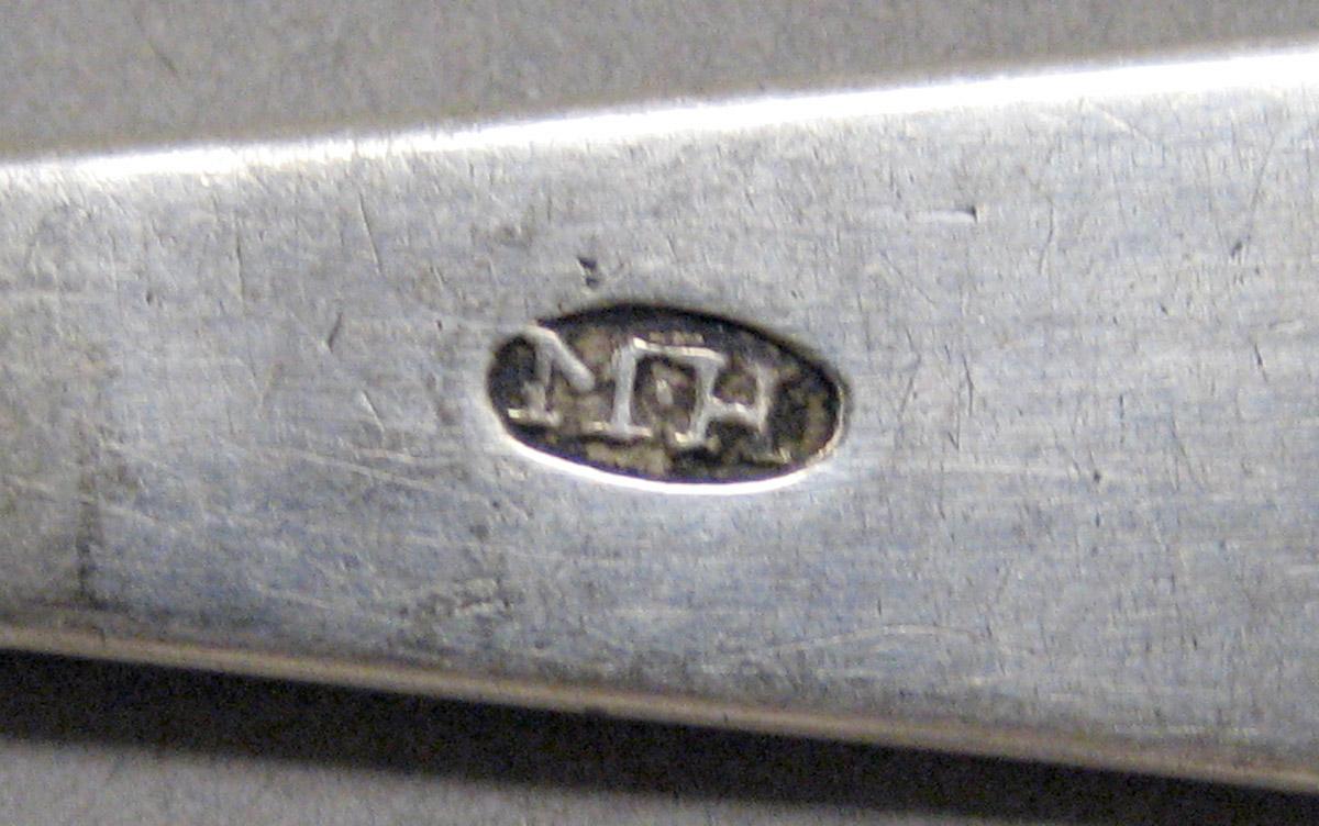 1998.0004.3595 Silver spoon mark