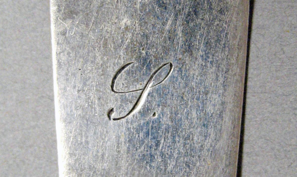 1998.0004.3597 Silver spoon engraving