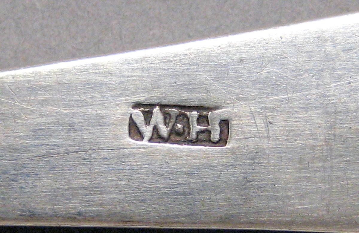 1998.0004.3599 Silver spoon mark
