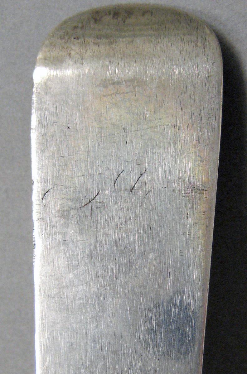 1998.0004.3604 Silver spoon engraving