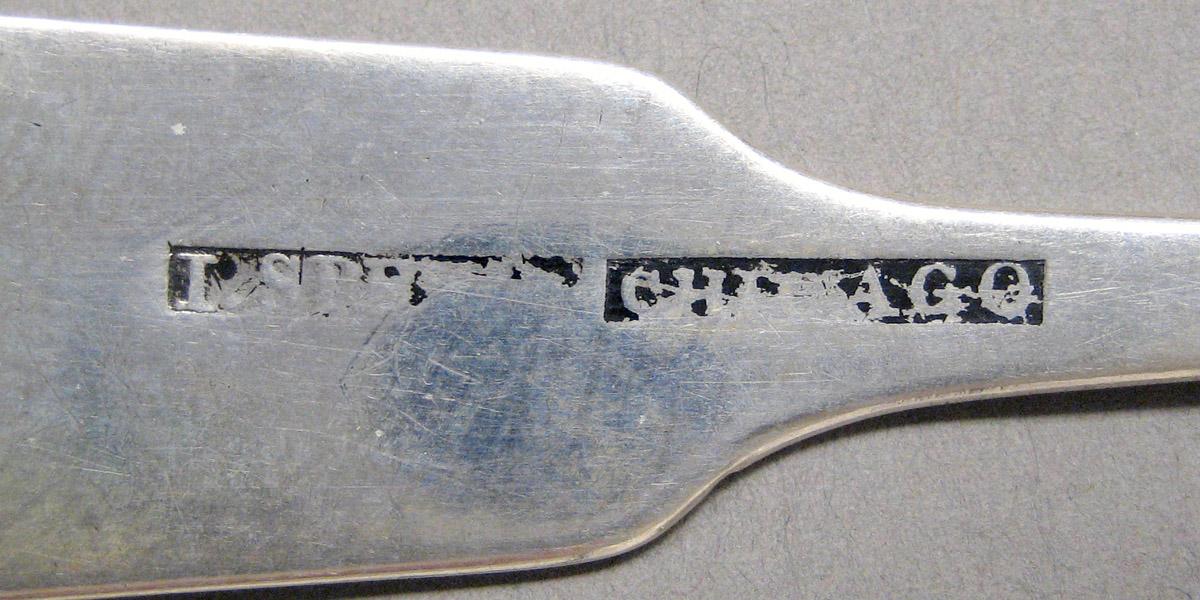 1998.0004.3604 Silver spoon mark