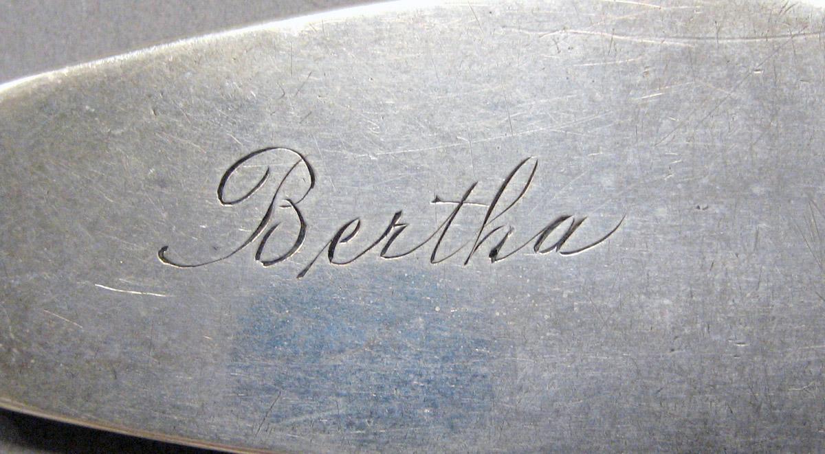 1998.0004.3605 Silver spoon engraving