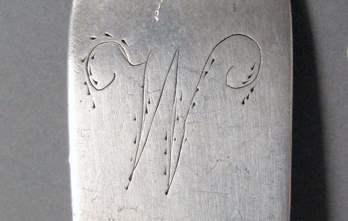 1998.0004.3611 Silver spoon engraving