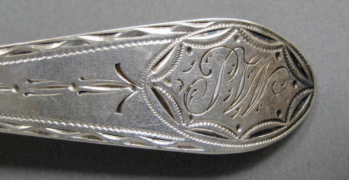 1998.0004.3614 Silver spoon engraving