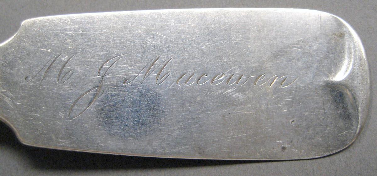 1998.0004.3615.001 Silver spoon engraving