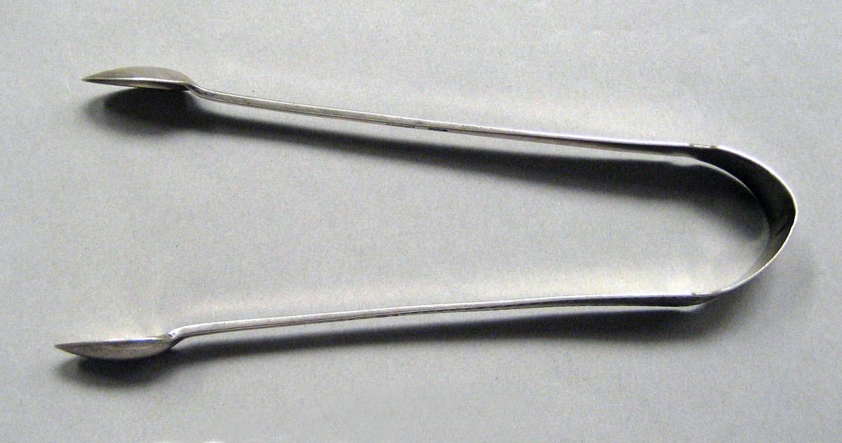 1998.0004.3616 Silver tongs view 2