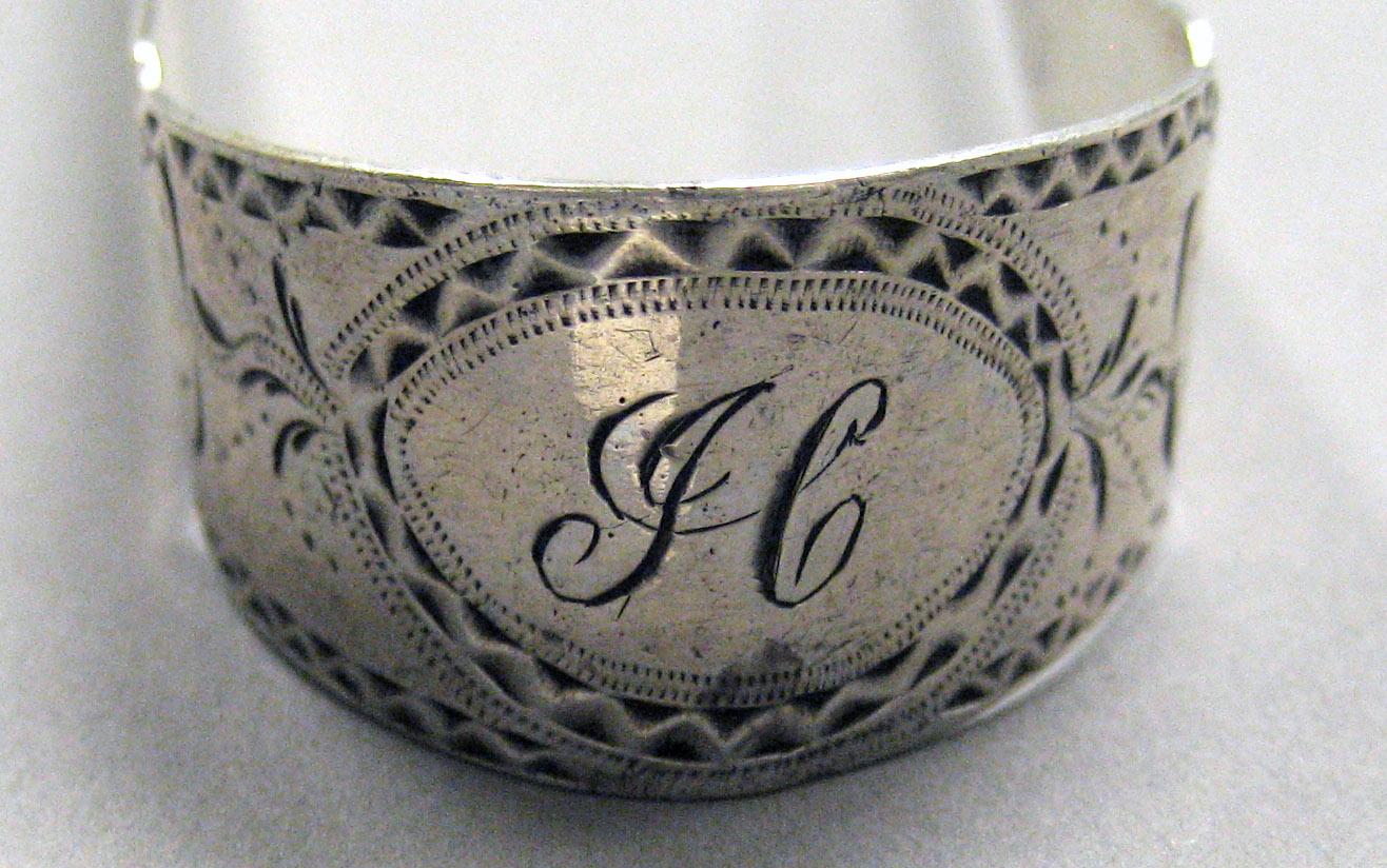 1998.0004.3616 Silver tongs engraving