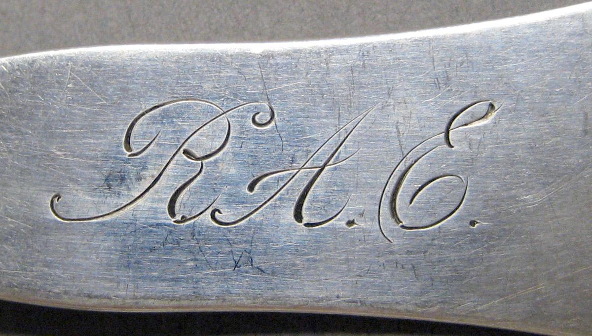1998.0004.3623 Silver spoon engraving
