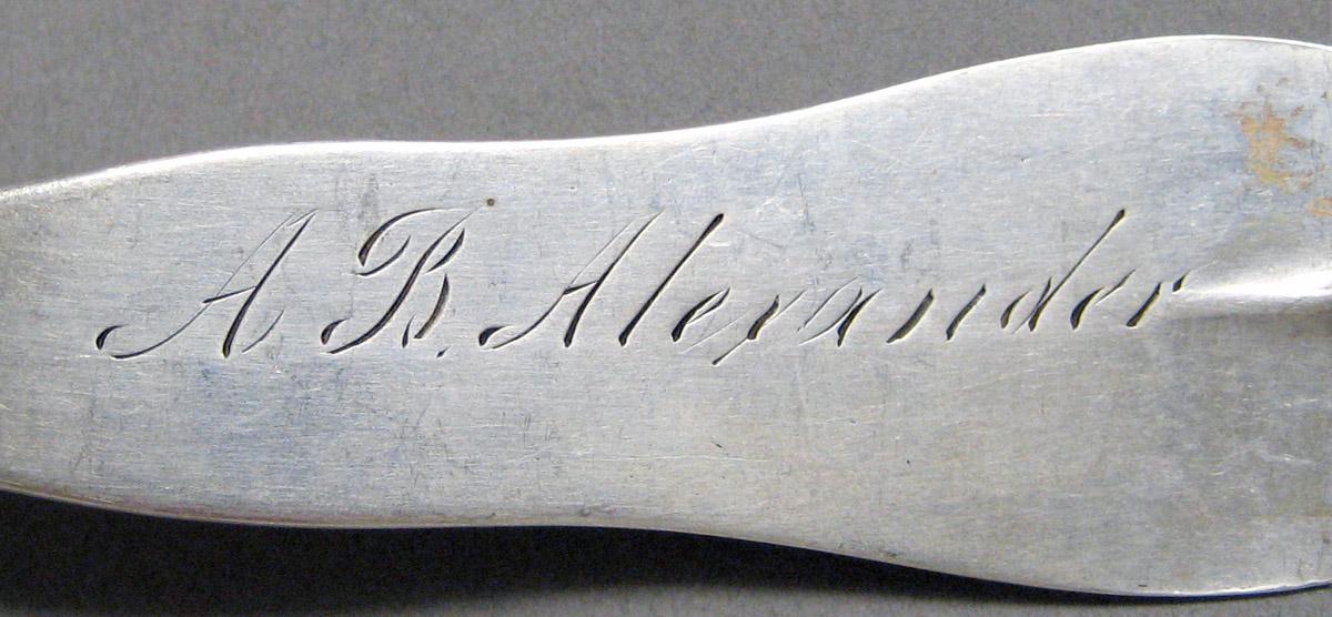 1998.0004.3634 Silver spoon engraving