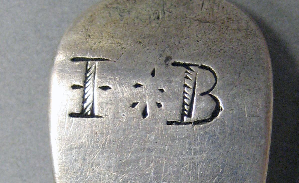 1998.0004.3642 Silver spoon engraving
