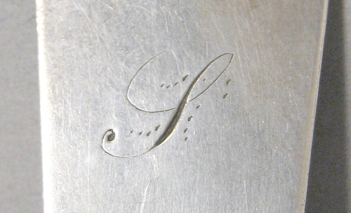 1998.0004.3651 Silver ladle engraving