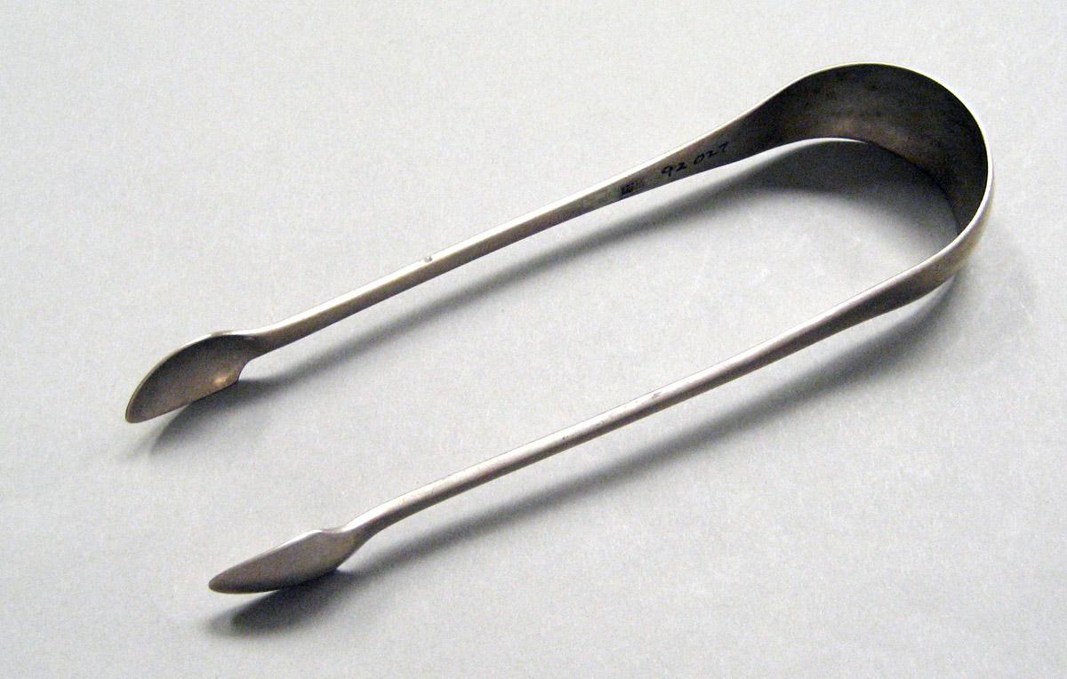 1998.0004.3652 Silver tongs view 1
