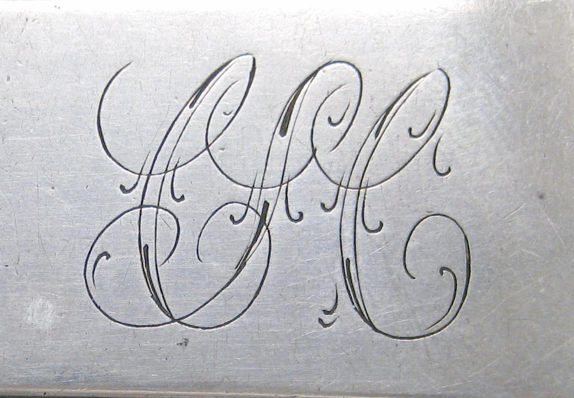 1998.0004.3659 Silver spoon engraving