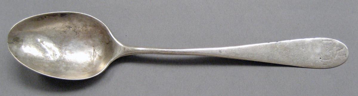 1998.0004.3661 Silver spoon upper surface