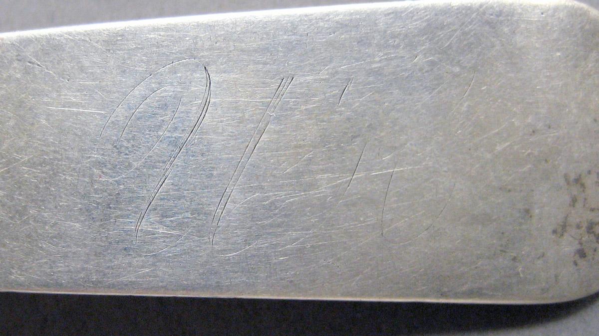 1998.0004.3663.001 Silver spoon engraving