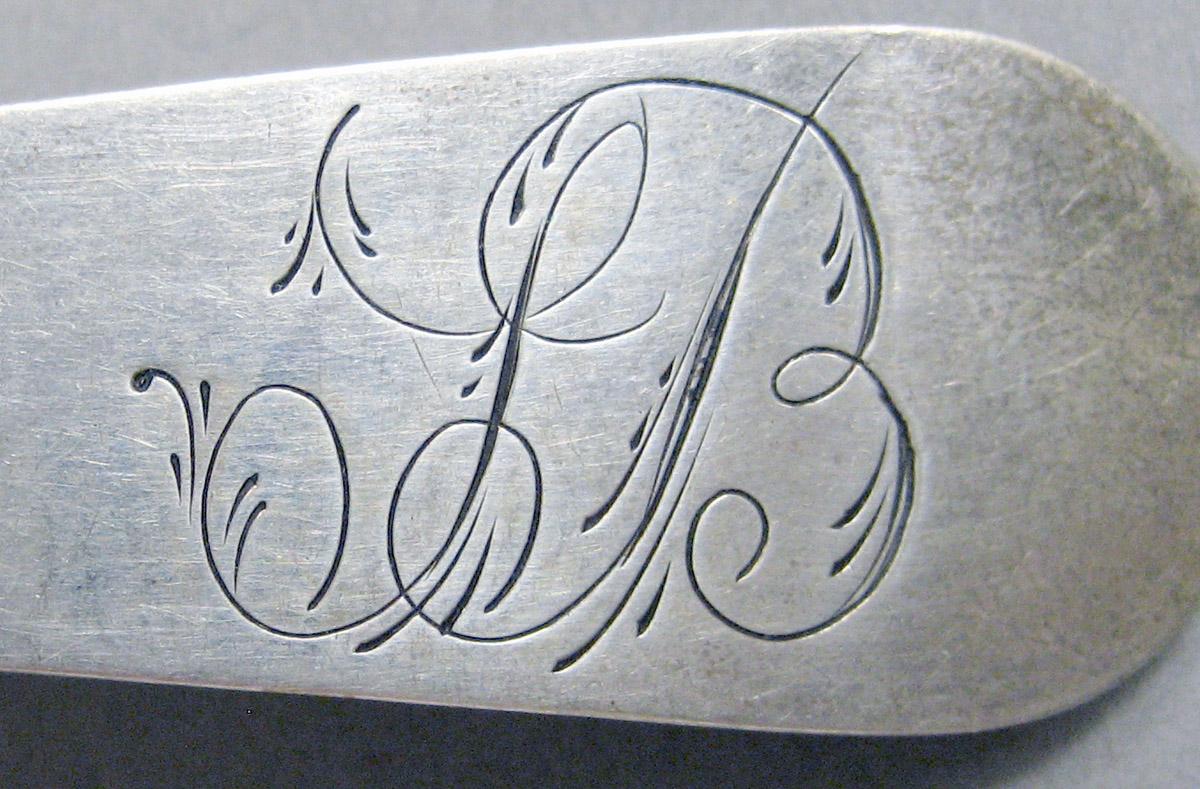 1998.0004.3666 Silver spoon engraving
