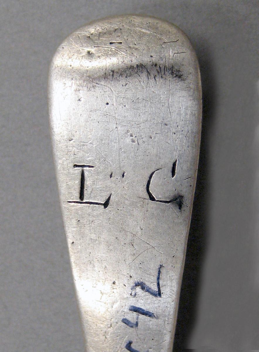 1998.0004.3667 Silver spoon engraving