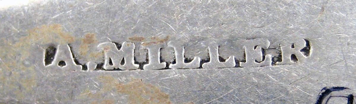 1998.0004.3669 Silver spoon mark