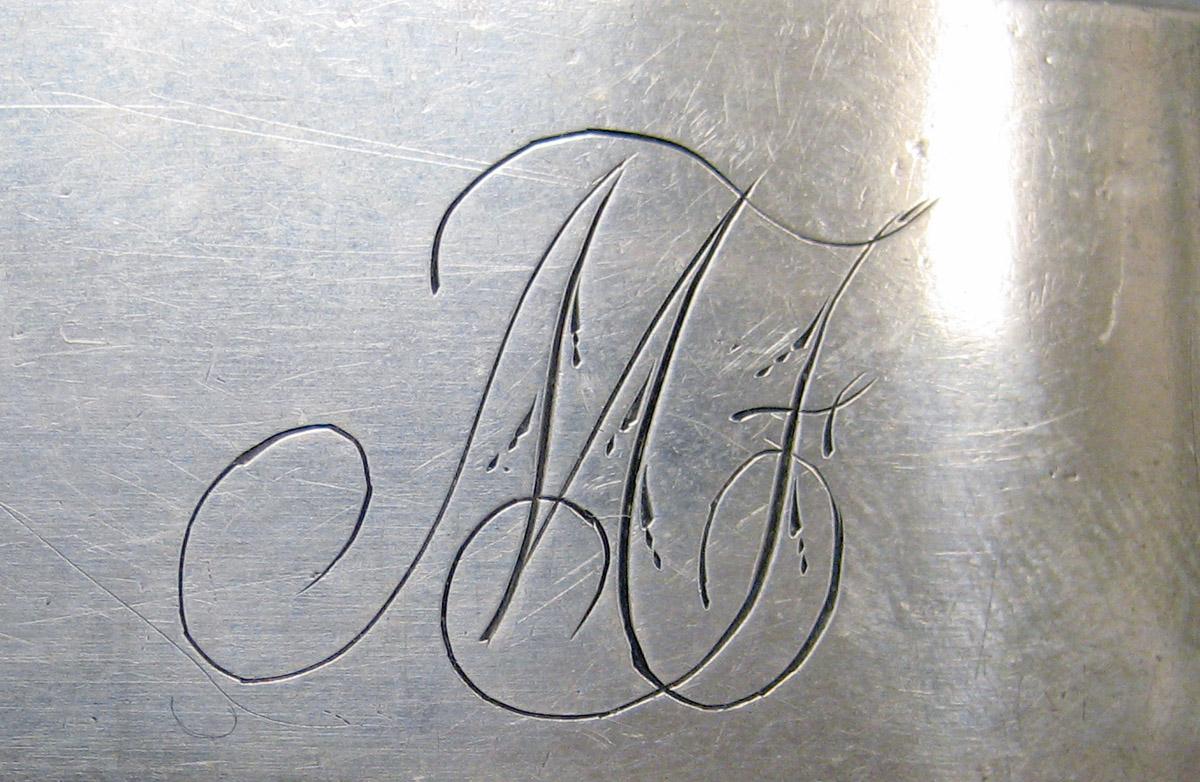 1998.0004.3670 Silver spoon engraving