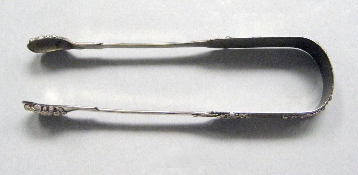 1998.0004.3678 Silver tongs view 2