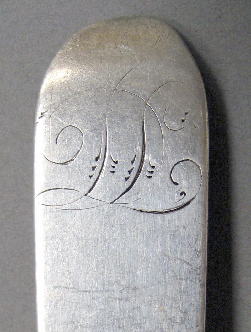 1998.0004.3692 Silver spoon engraving