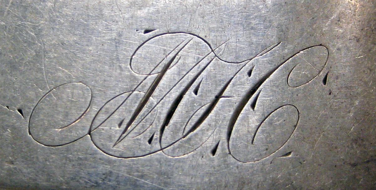 1998.0004.3693 Silver spoon engraving