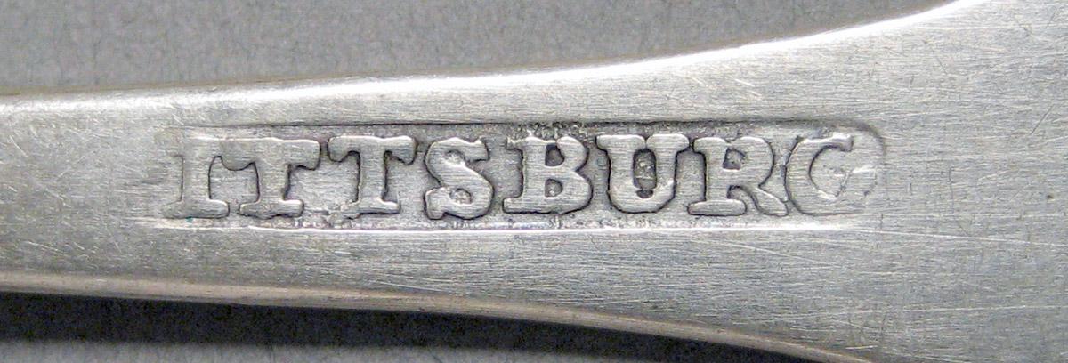 1998.0004.3697.001 Silver spoon mark