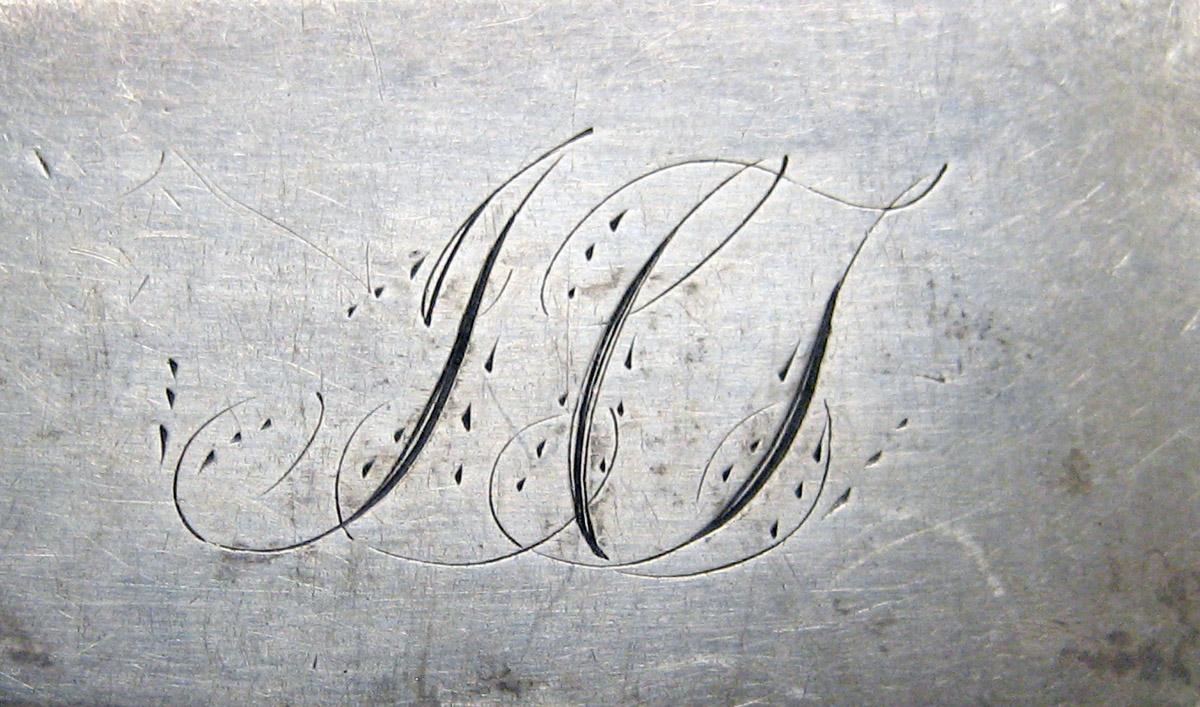 1998.0004.3701 Silver spoon engraving
