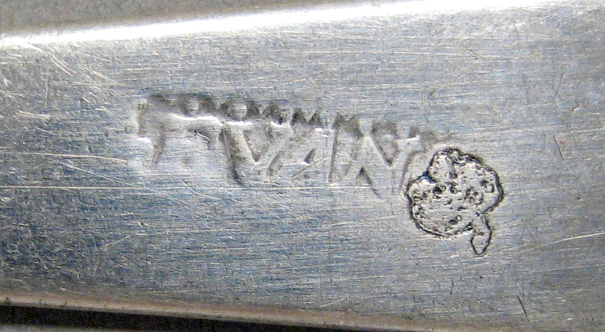 1998.0004.3703 Silver spoon mark