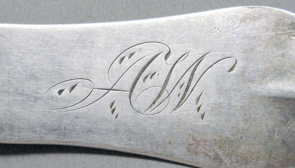 1998.0004.3704 Silver spoon engraving